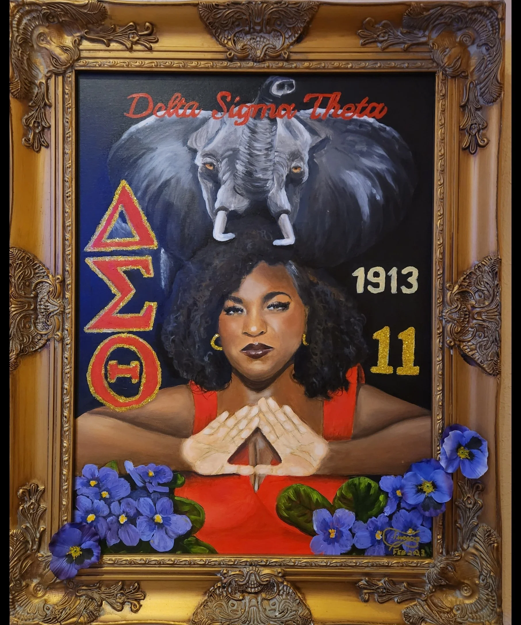 A painting of a woman with dark curly hair, wearing a red dress, with her hands folded in a prayer-like pose, surrounded by purple flowers. Behind her, there is a black background with the Greek letters Sigma and Delta in red and yellow on the left, 