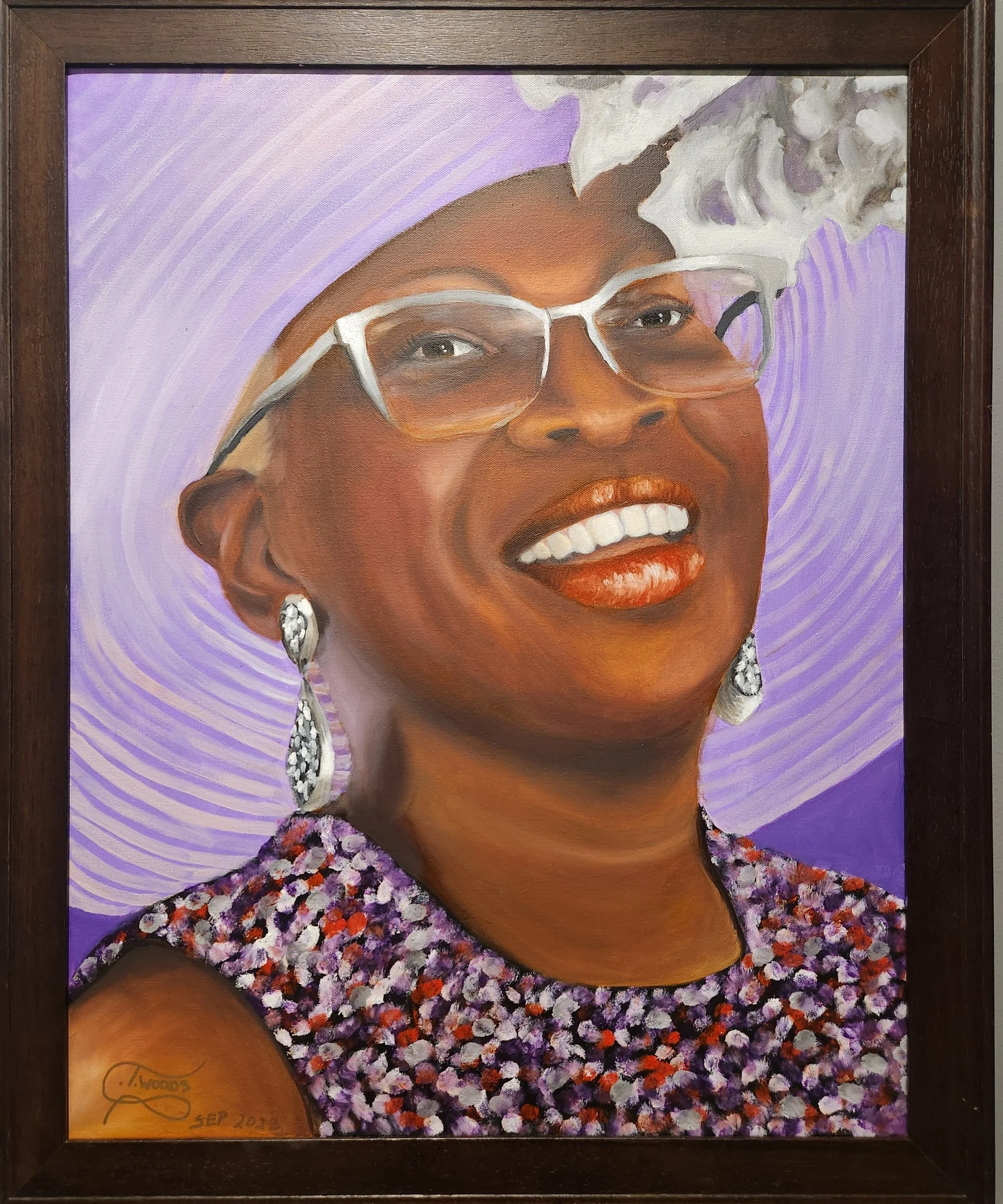 A portrait of a smiling African American woman wearing glasses, earrings, a purple hat, and a multicolored top, set against a purple and white swirl background.