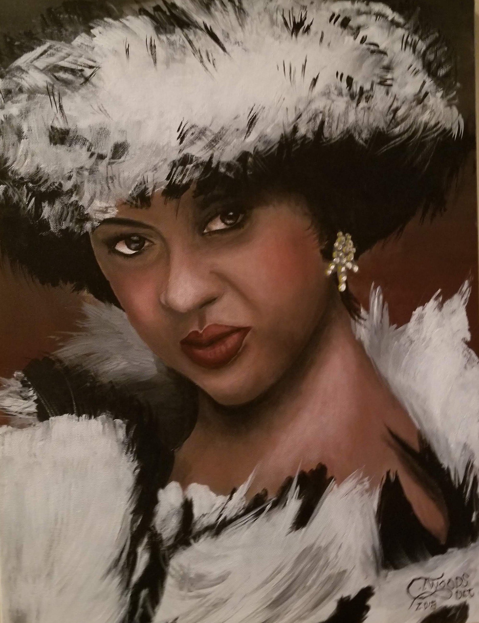 A portrait of a woman wearing a large feathered hat and matching feathered clothing, with makeup and earrings, looking directly at the camera.