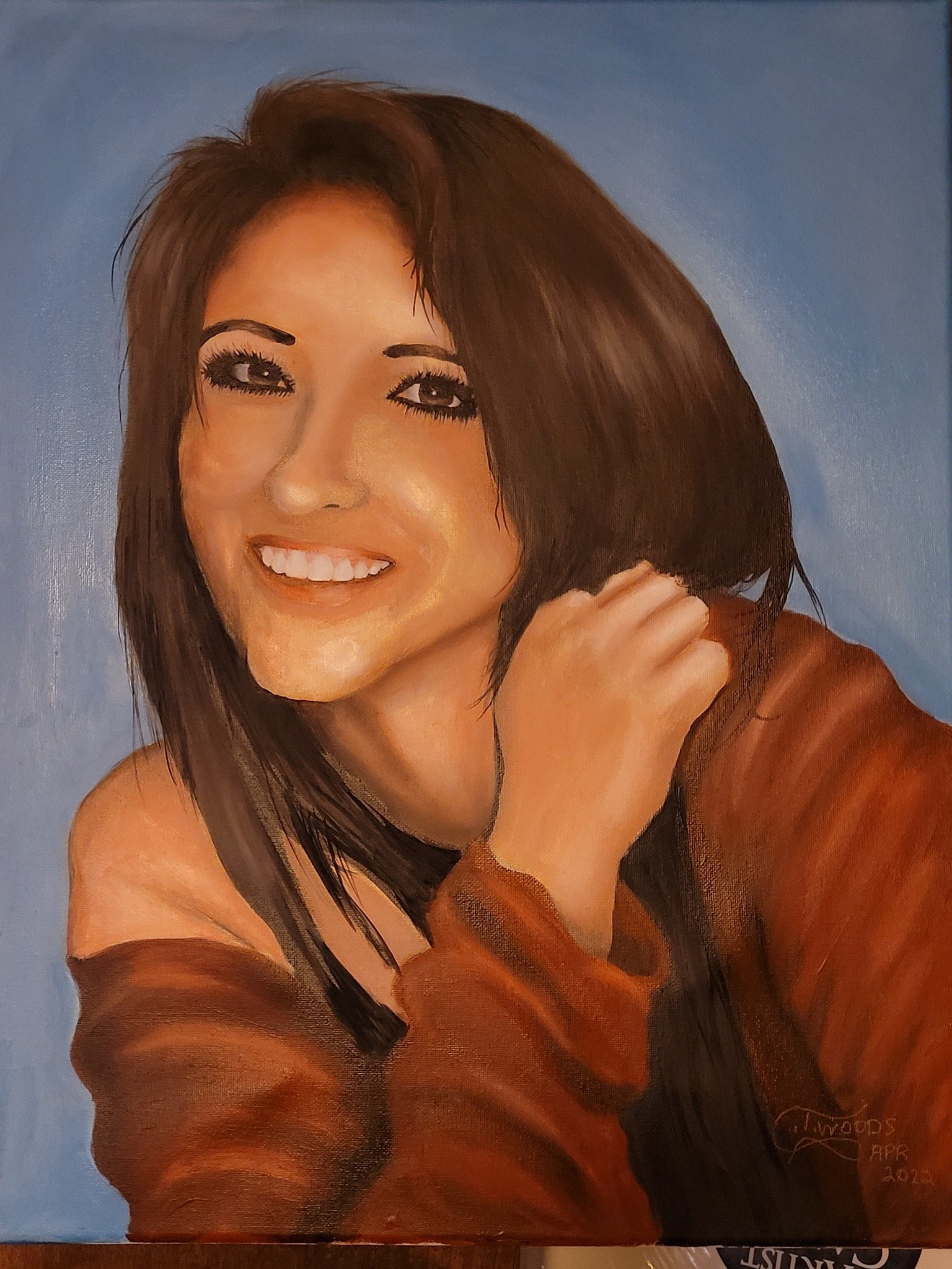 Hand-painted portrait of a woman with short brown hair, smiling, wearing a brown leather jacket, against a blue background.
