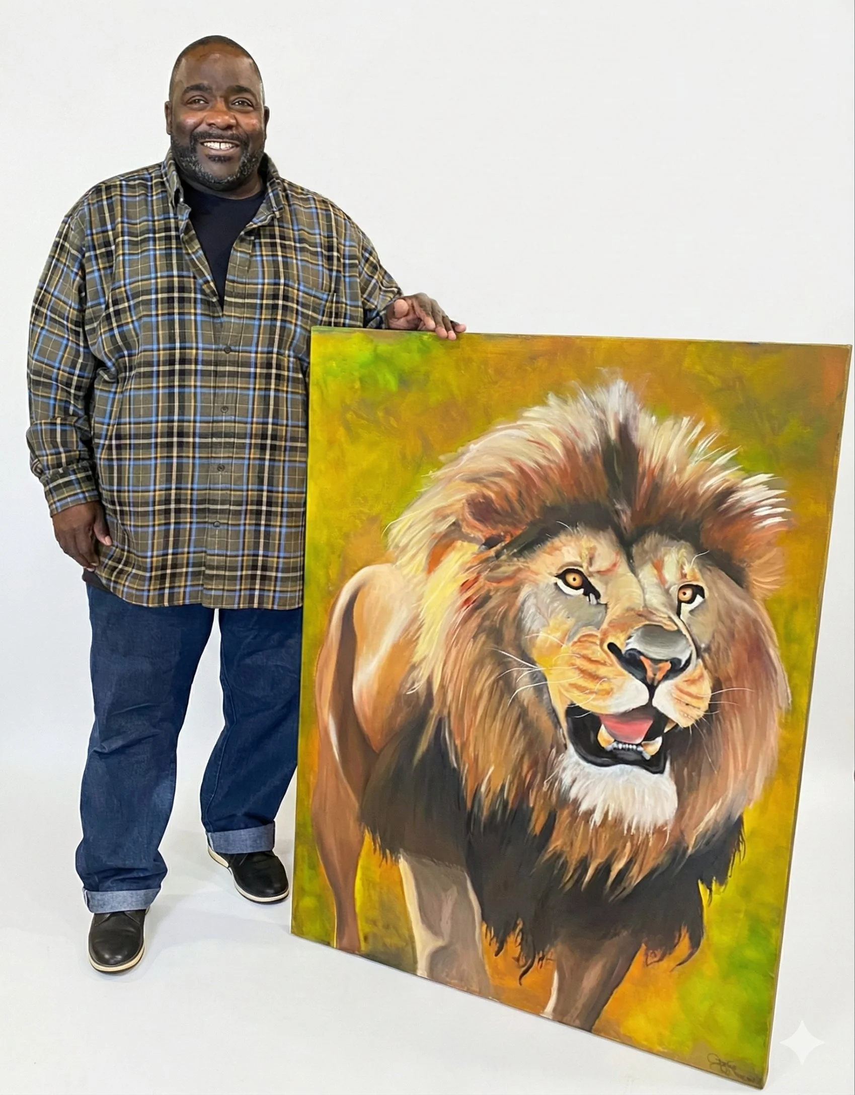 A man standing next to a large, colorful painting of a lion with a bright yellow, orange, and green background.