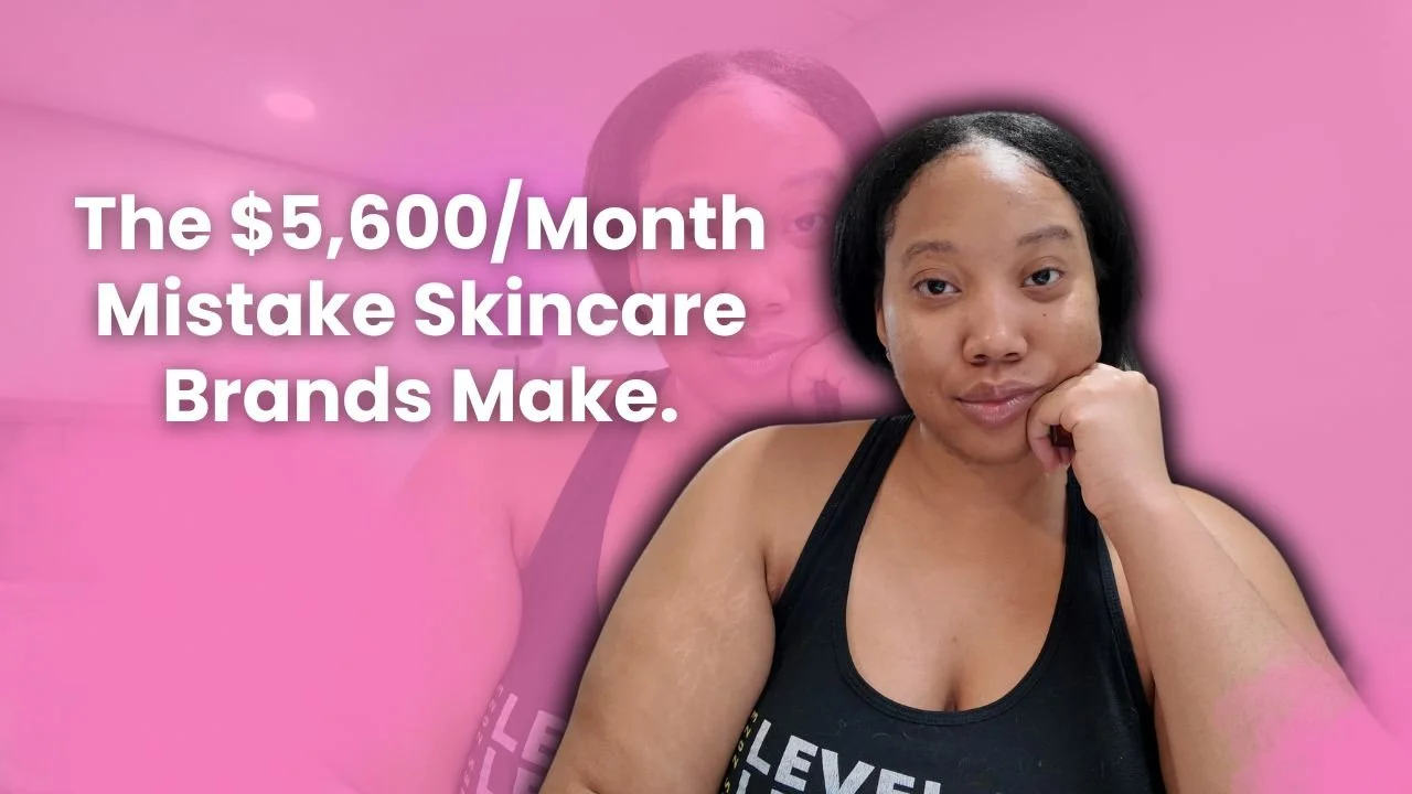 A woman with black hair wearing a black tank top has a thoughtful expression with her hand near her chin, and behind her, a pink background features a faded, larger image of her face. Bold white text on the image says: 'The $5,600/Month Mistake Skinc