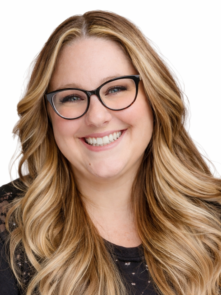Rachel, hairstylist and color specialist in Folsom, California, The Hair Duchess, smiling in salon portrait