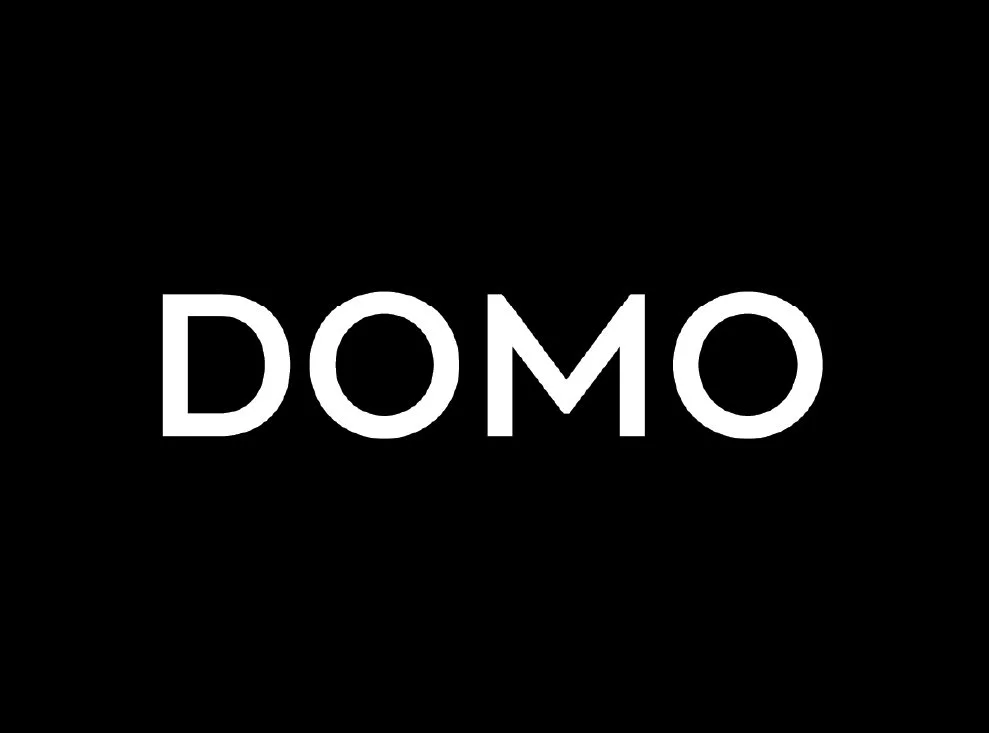Black background with the white word 'DOMO' in the center.
