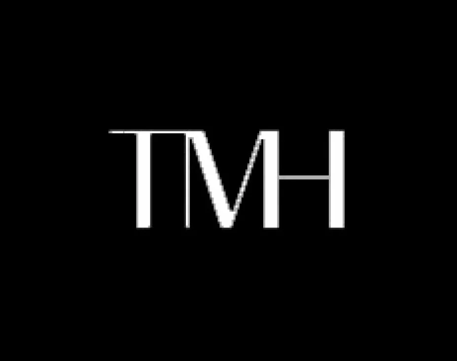 Black background with the white and gray text 'TVH' in the center.