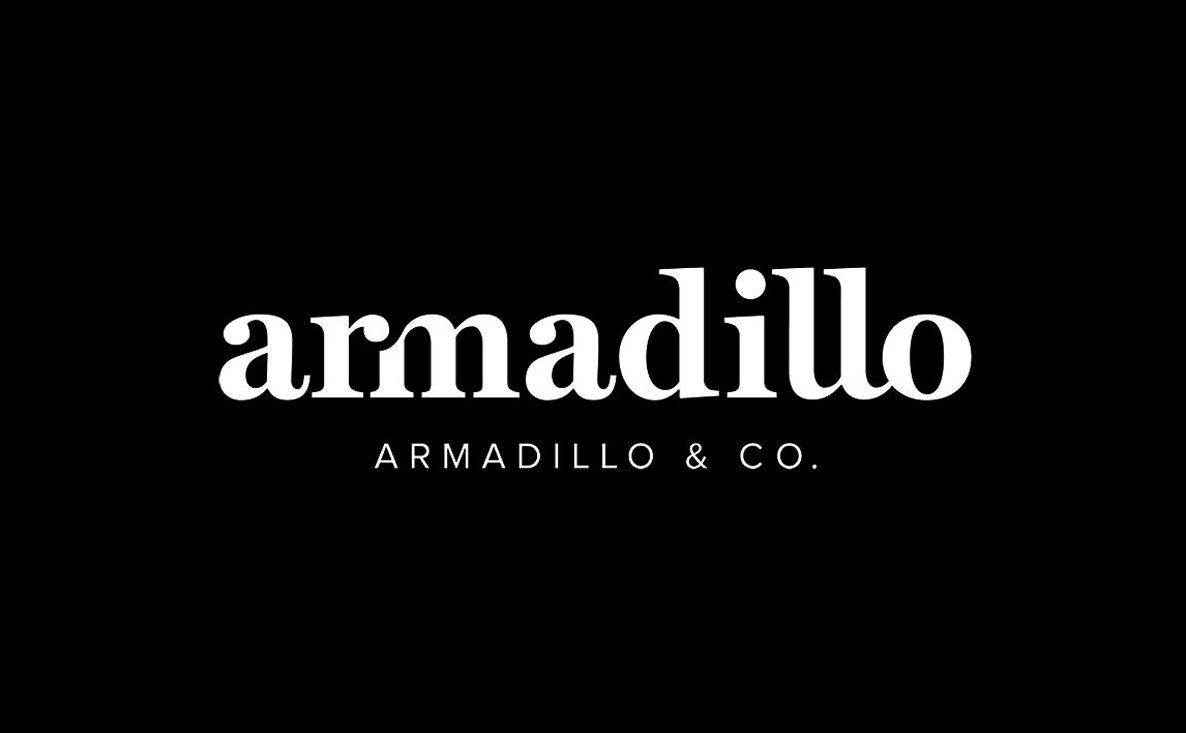Black background with white text displaying "armadillo" in large font and "ARMADILLO & CO." in smaller font underneath.