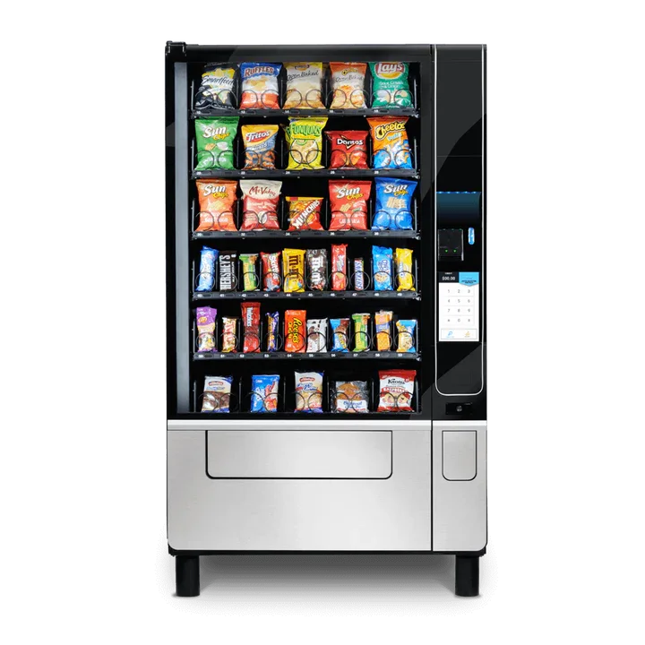 A vending machine filled with various snack bags including chips and chocolate bars.