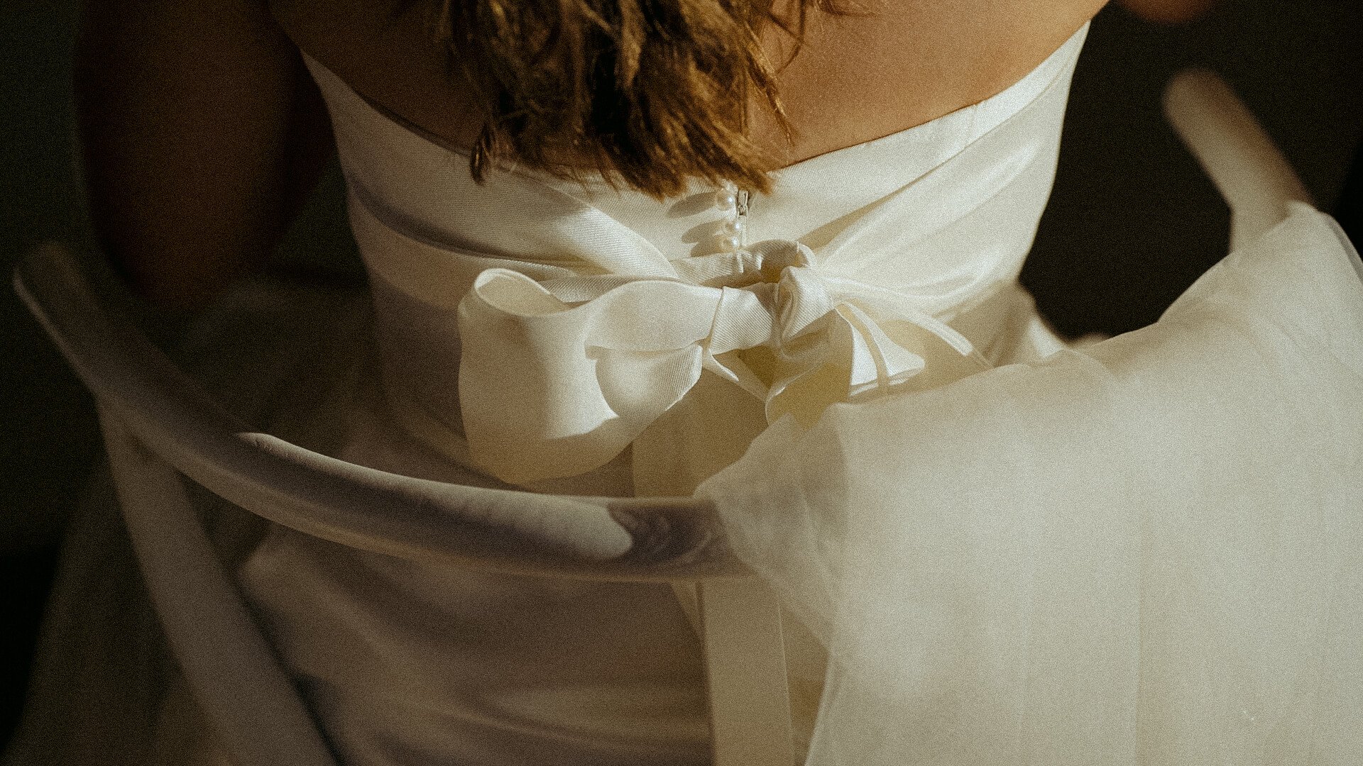 Wedding dress details at sunset