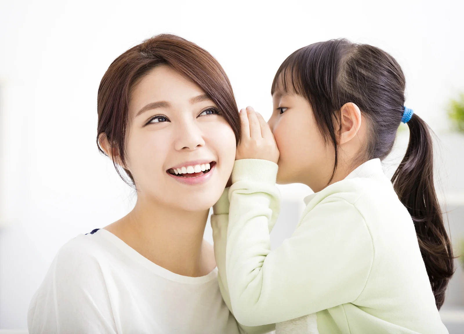 bigstock-Mother-And-Daughter-Whispering-119150045.jpg
