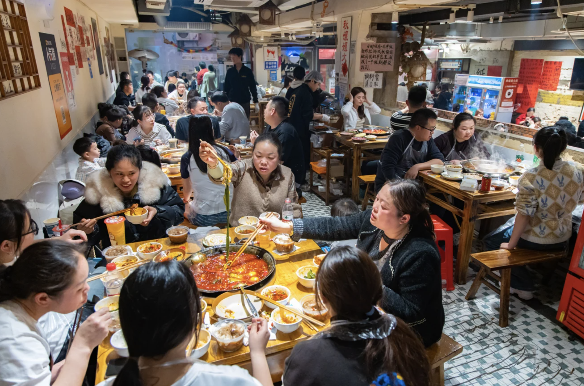 Chongqing people eating hotpot at a local restaurant