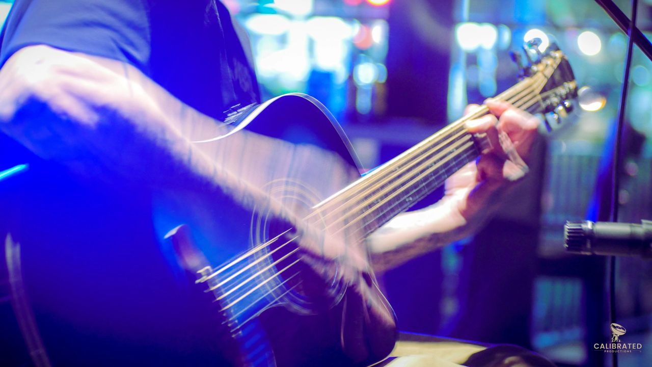 Close up shot of a guitar with motion blur