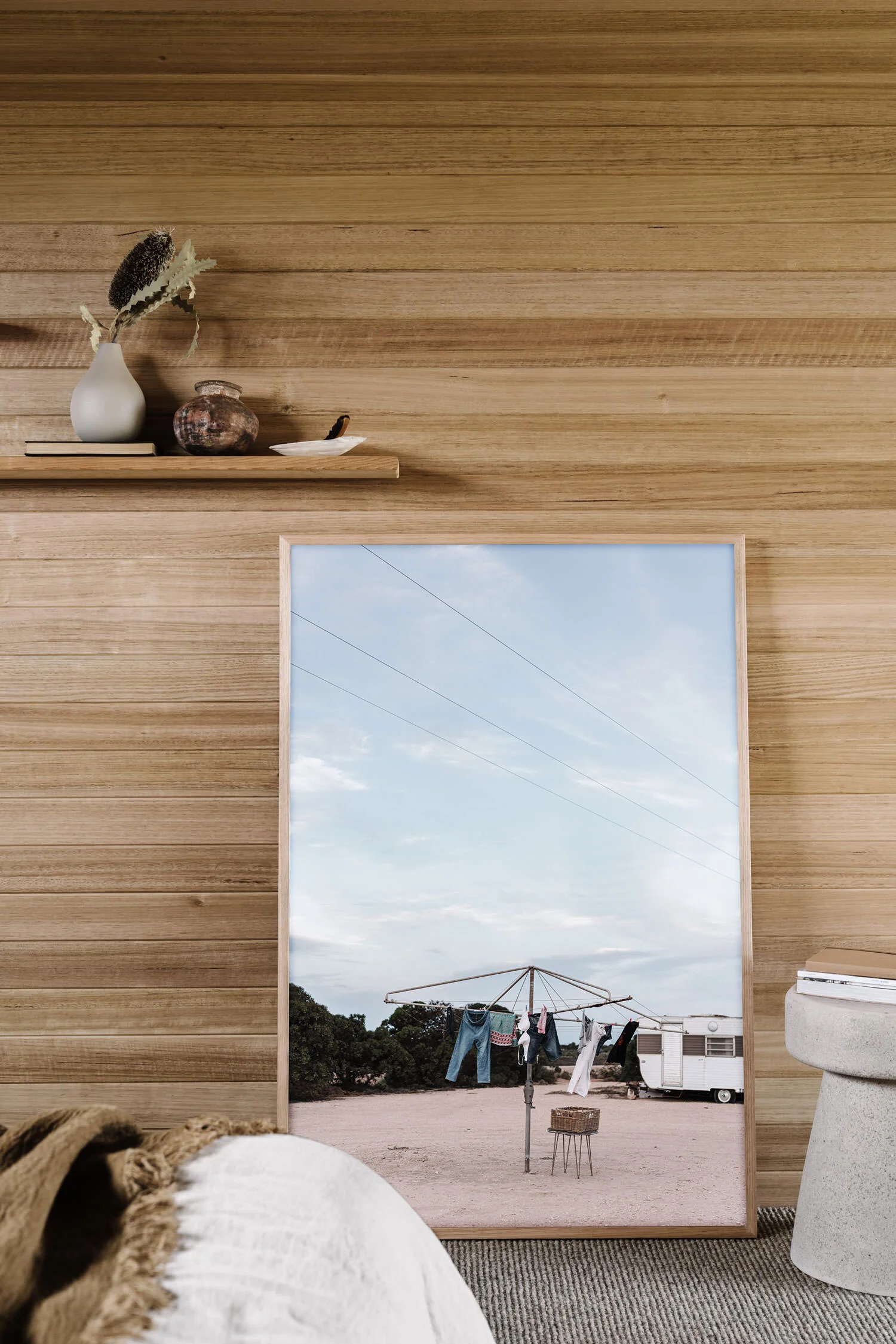 Out to Dry print in a timber-lined room
