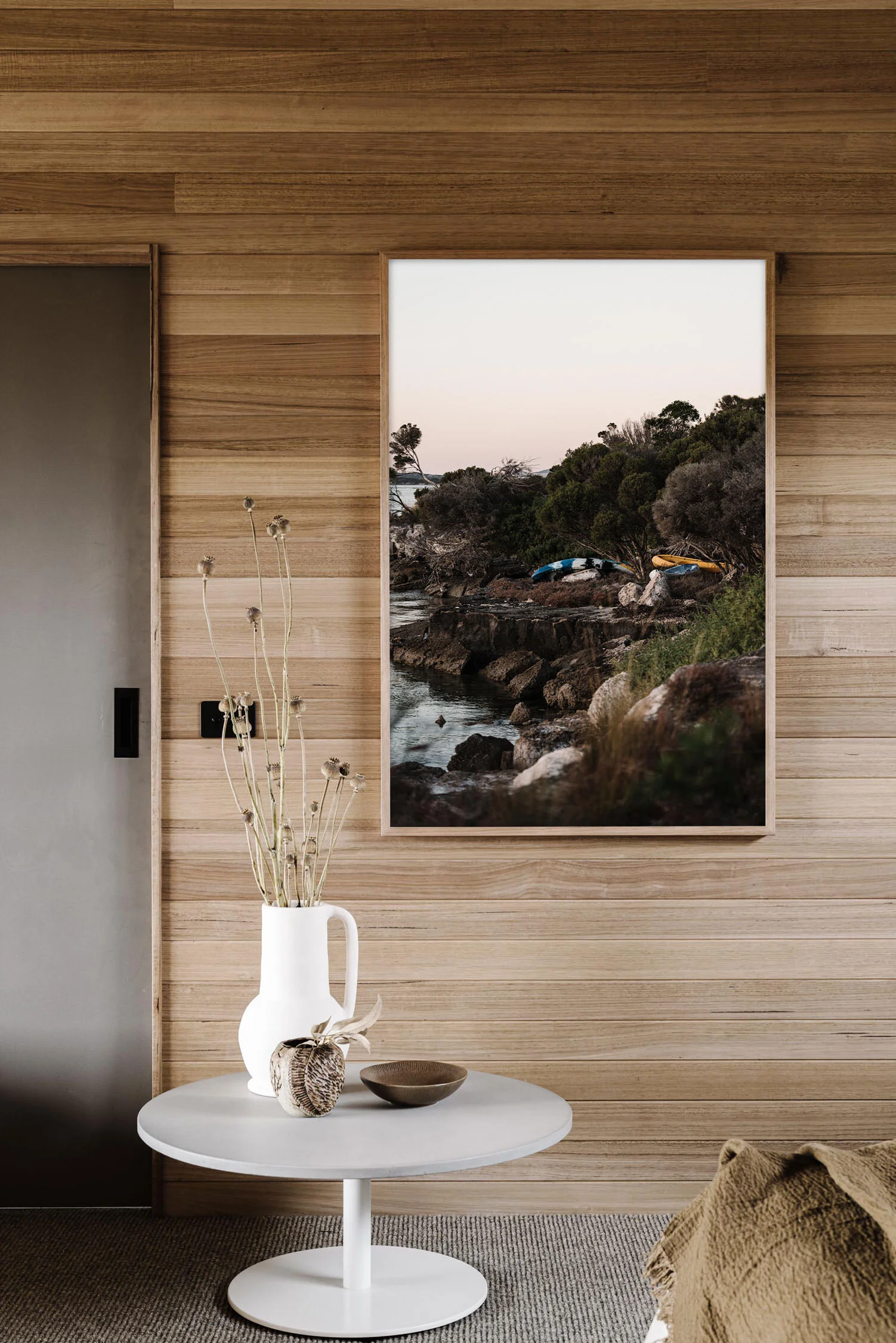 Overturned in Coffin Bay print in a timber-lined room