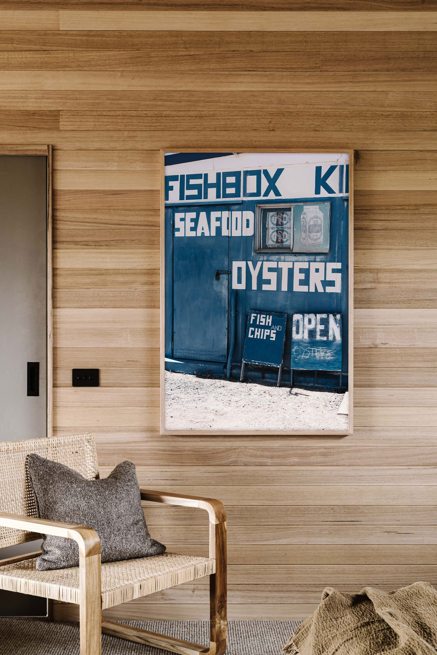 Fishbox Kiosk, Cowell print in a timber-lined room