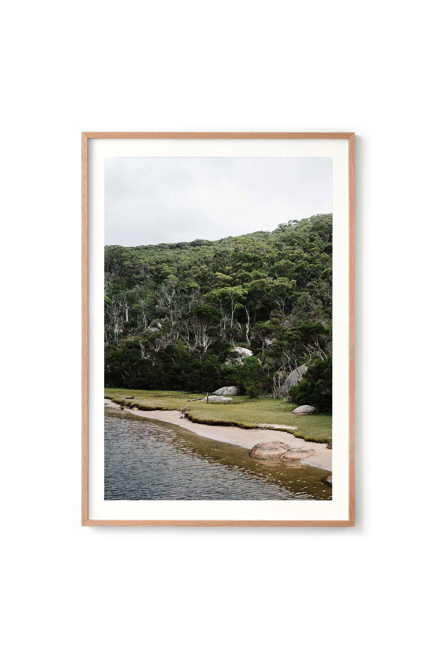 Prehistoric Tidal River print in an oak frame
