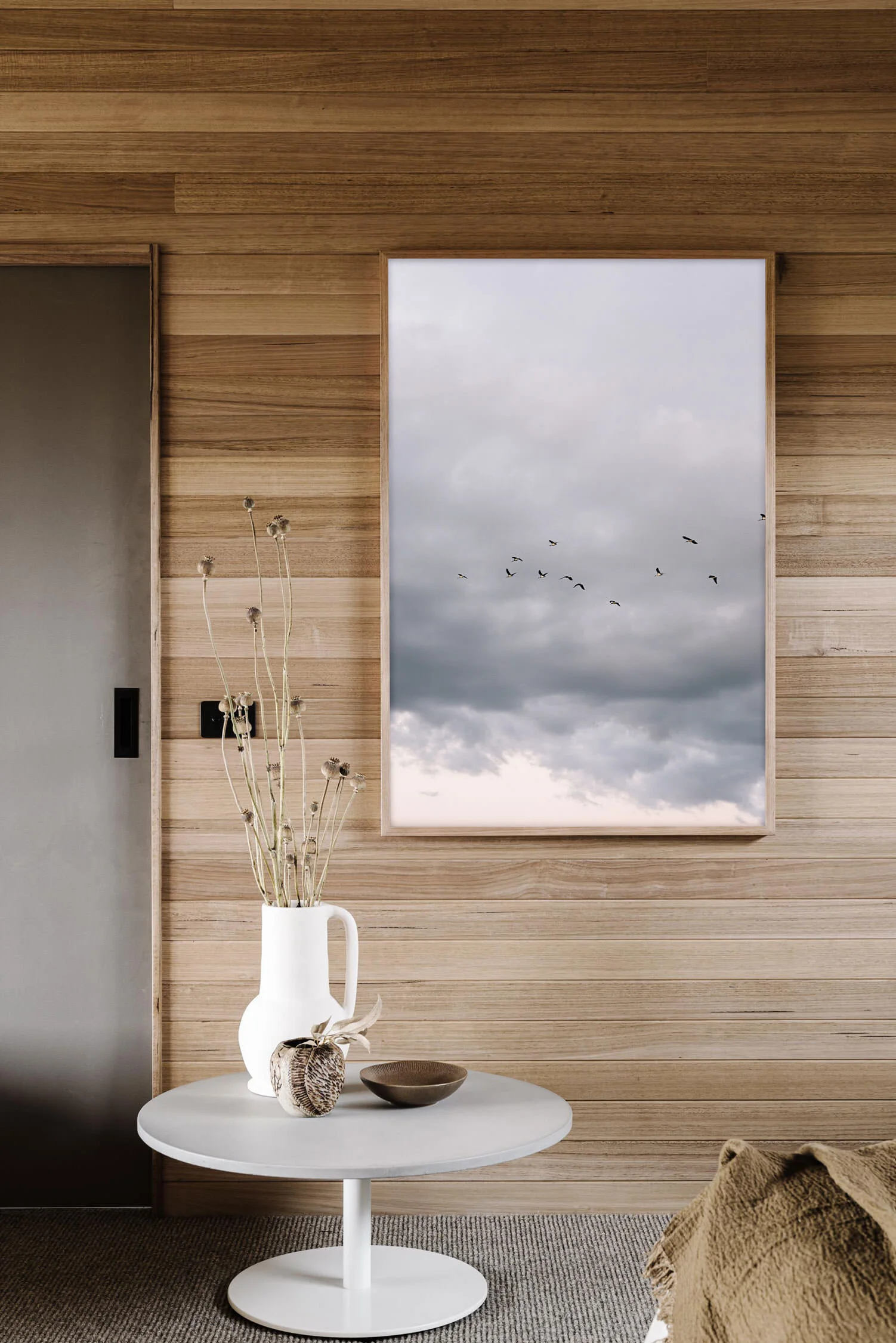 A Storm Is Coming, Broome print in a timber-lined room