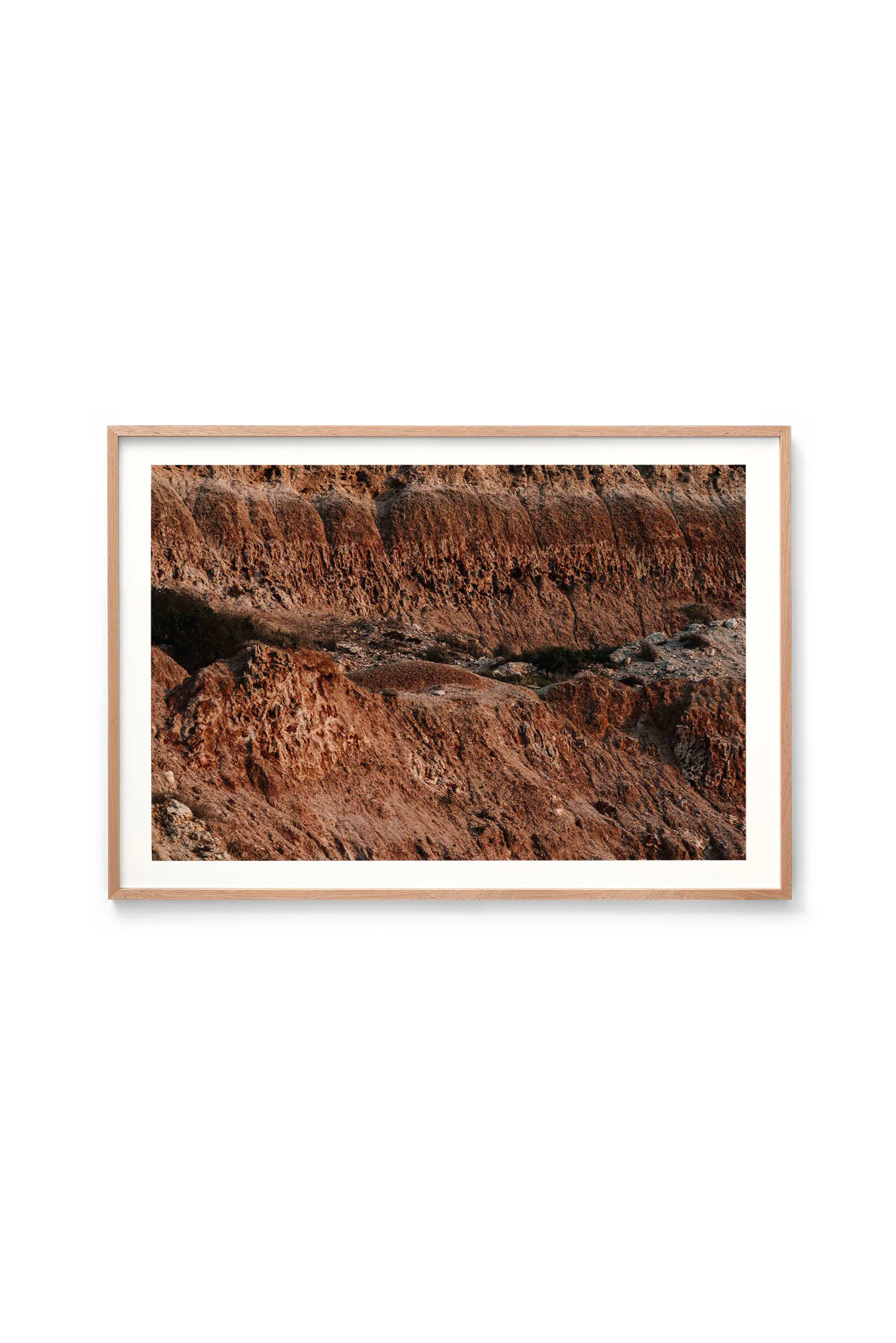 Red Earth print in an oak frame, landscape orientation