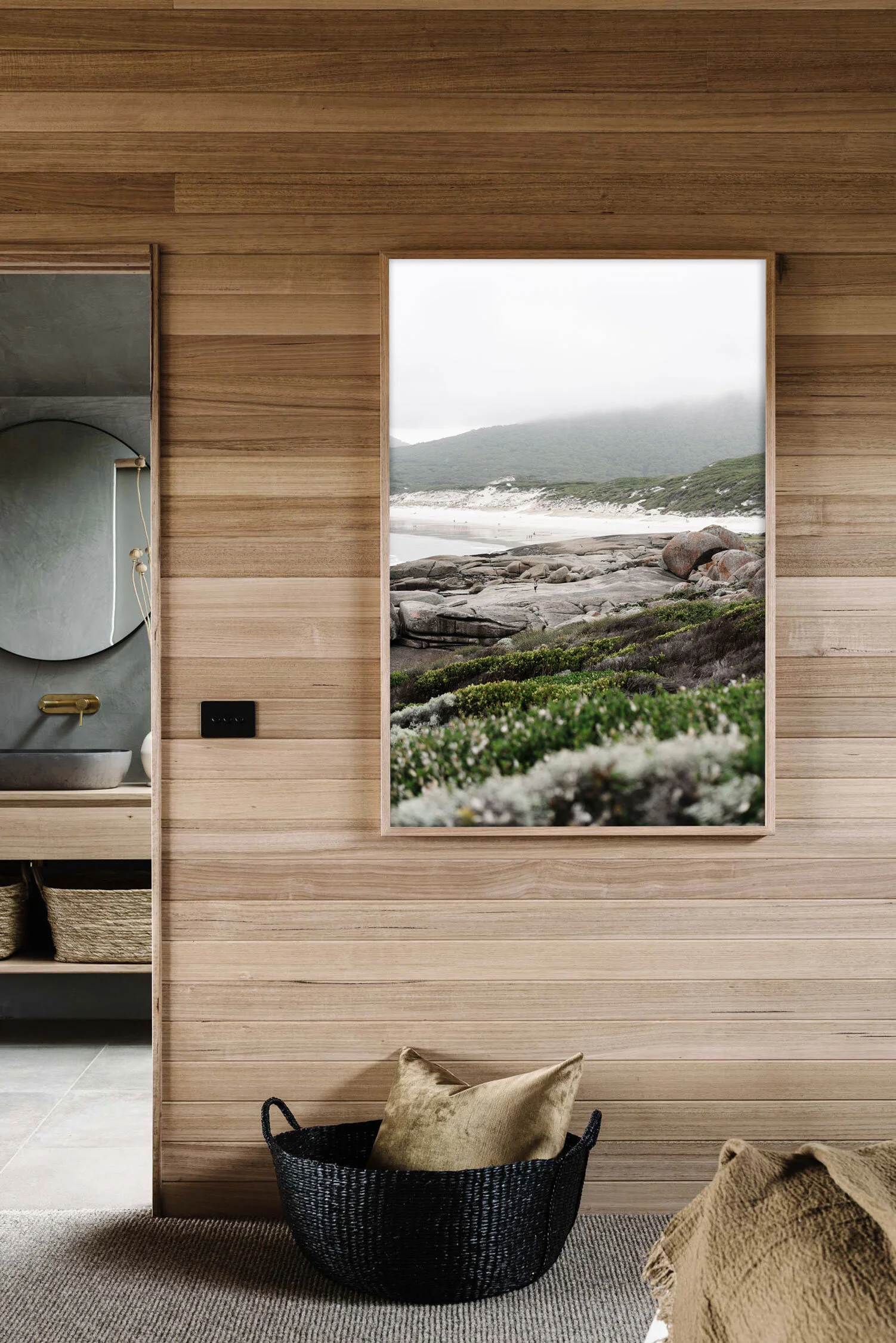 Squeaky Beach print in a timber-lined room