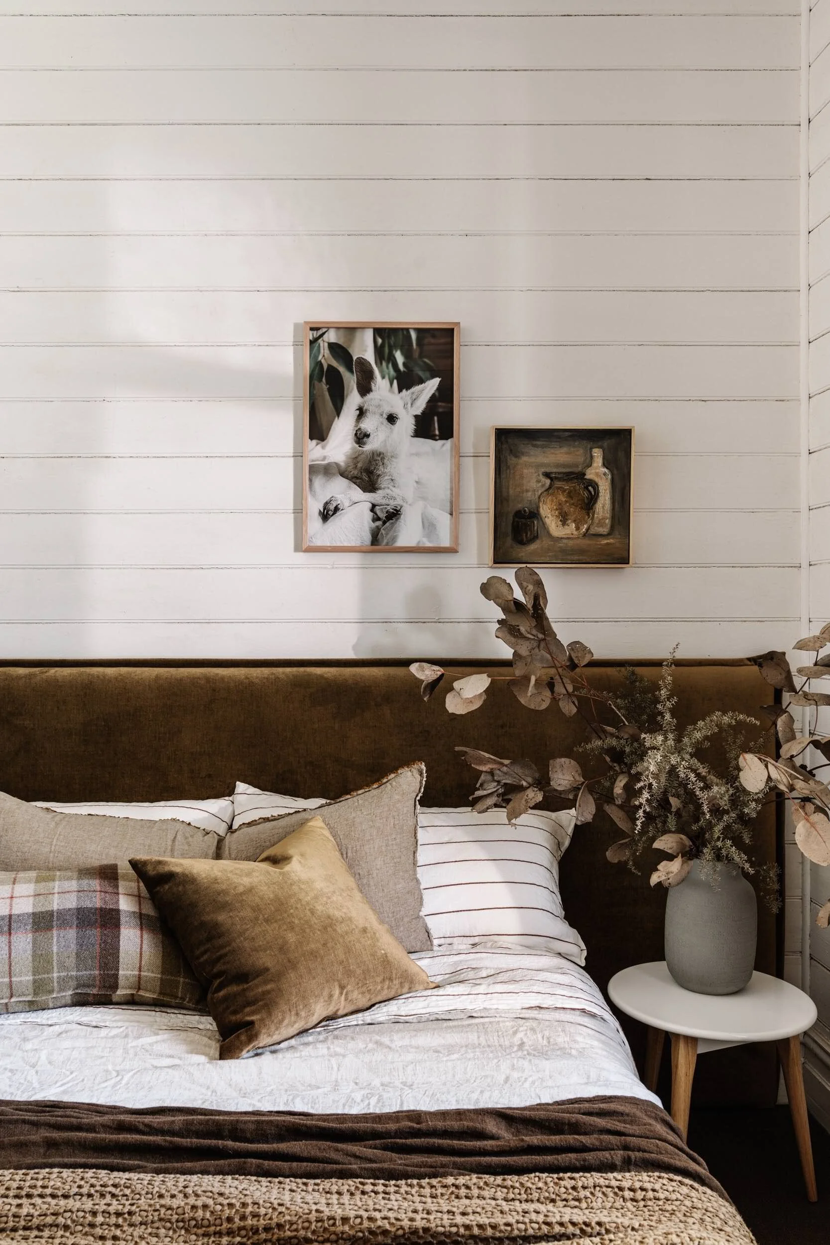 Angel the white kangaroo print above a bed