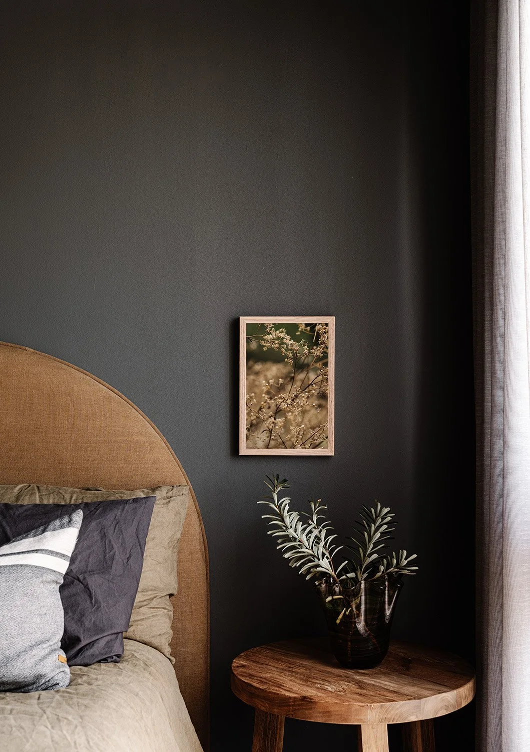 Tiny Octopus Fern print above a bedside table