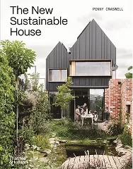 The New Sustainable House book cover, dark timber home among trees