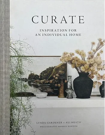 Curate book cover, styled interior with dried flowers and ceramics