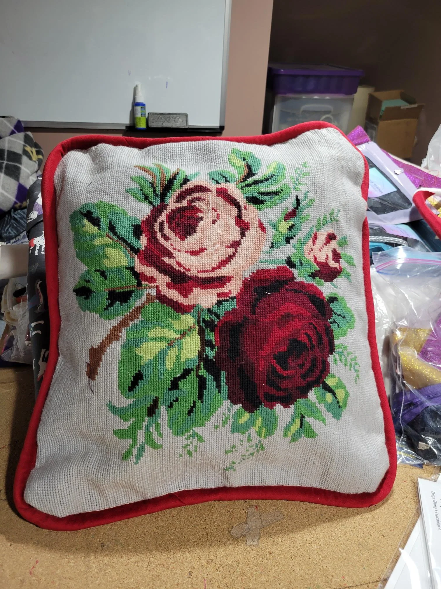 Made needlepoint into custom pillow cover with piping