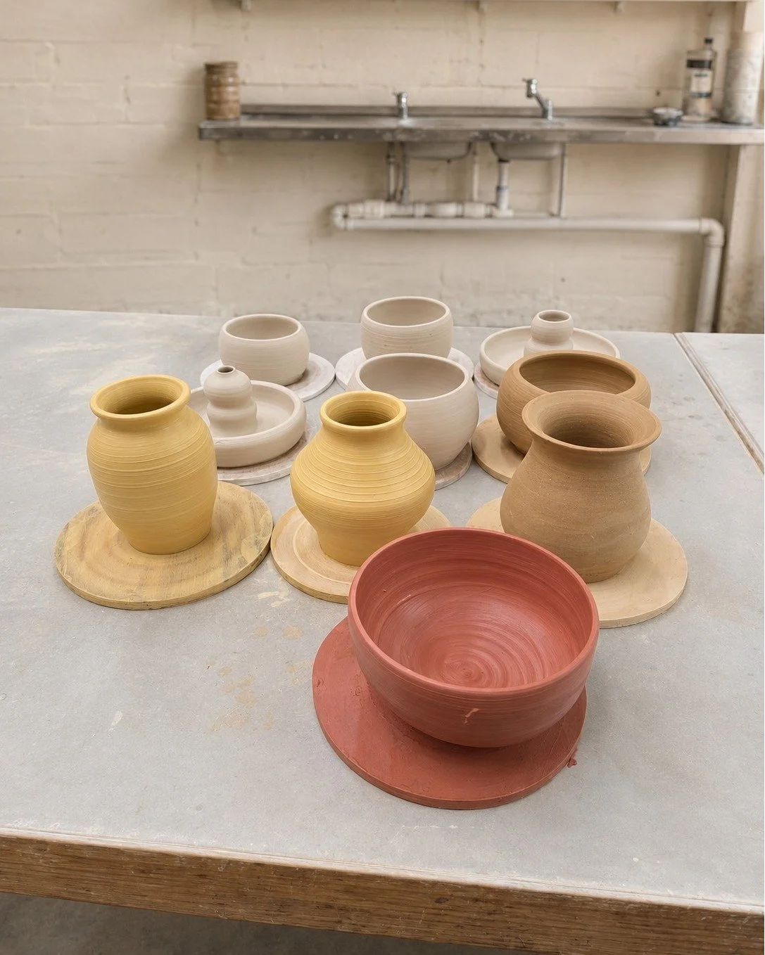 Fresh from the wheel and still finding their final form.

These vessels are now ready for the next stage of the process &mdash; drying, refining and eventually glazing.

A few may be selected for the Artist in Residence exhibition, to be held on 4&nd