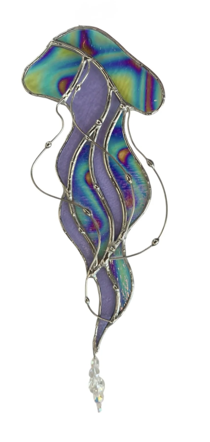 A decorative jellyfish-shaped ornament made of iridescent glass with metal wire accents and a dangling crystal at the bottom.
