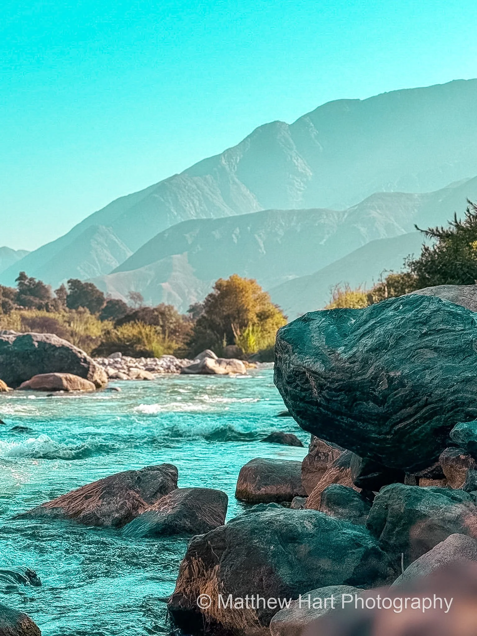 Boulder and River