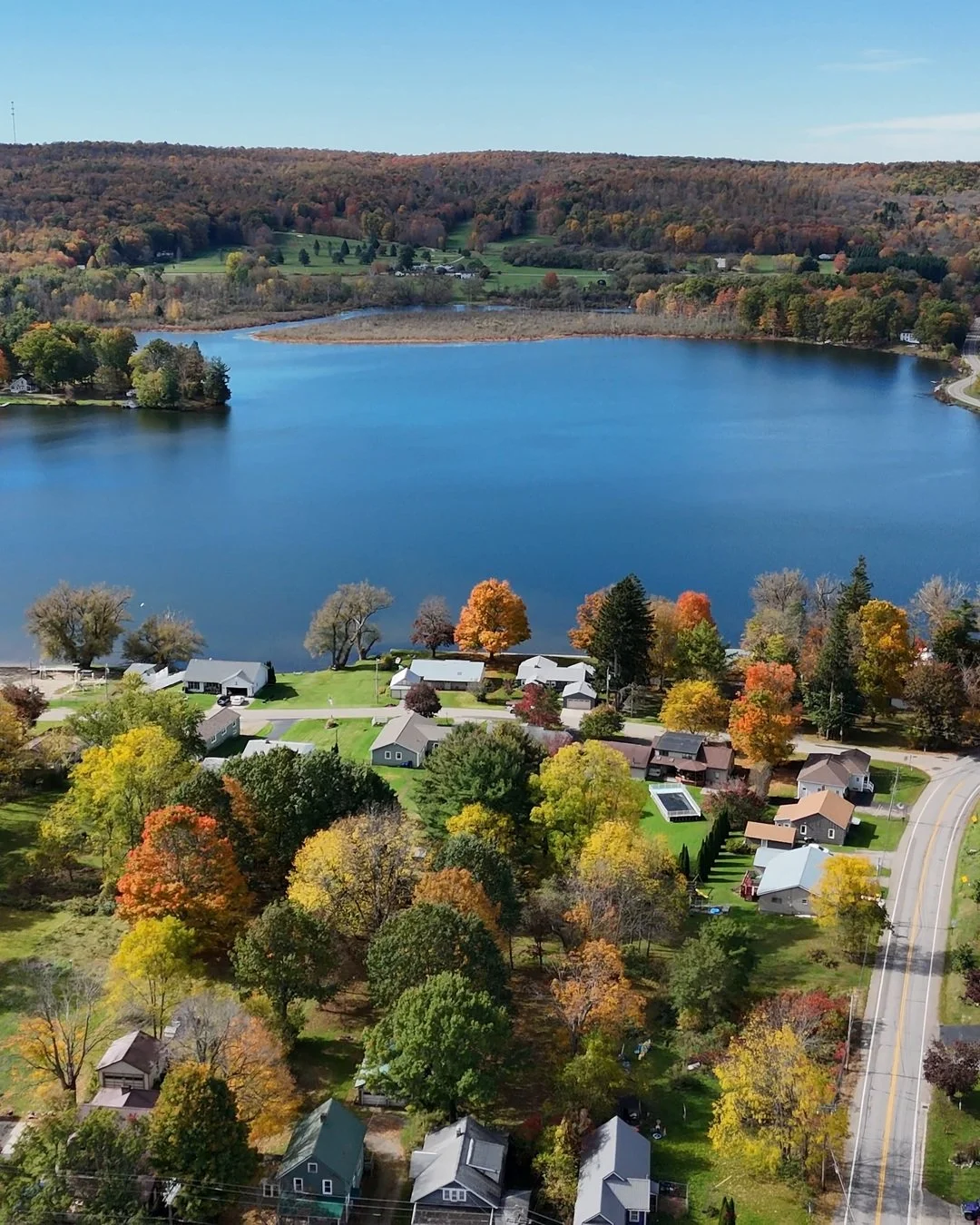 Aerial view of Cassadaga Lakes connecting the village to the water