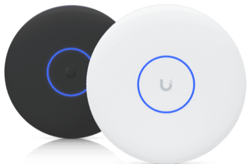 Two portable wireless speakers, one black with a blue circular light and one white with a blue circular light, positioned side by side.