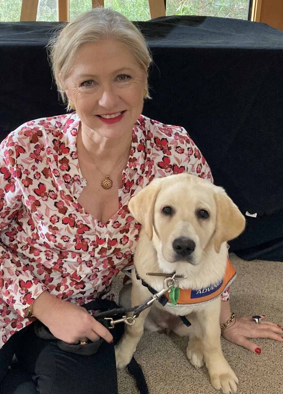Jaqui Bond with a Guide Dog puppy in training