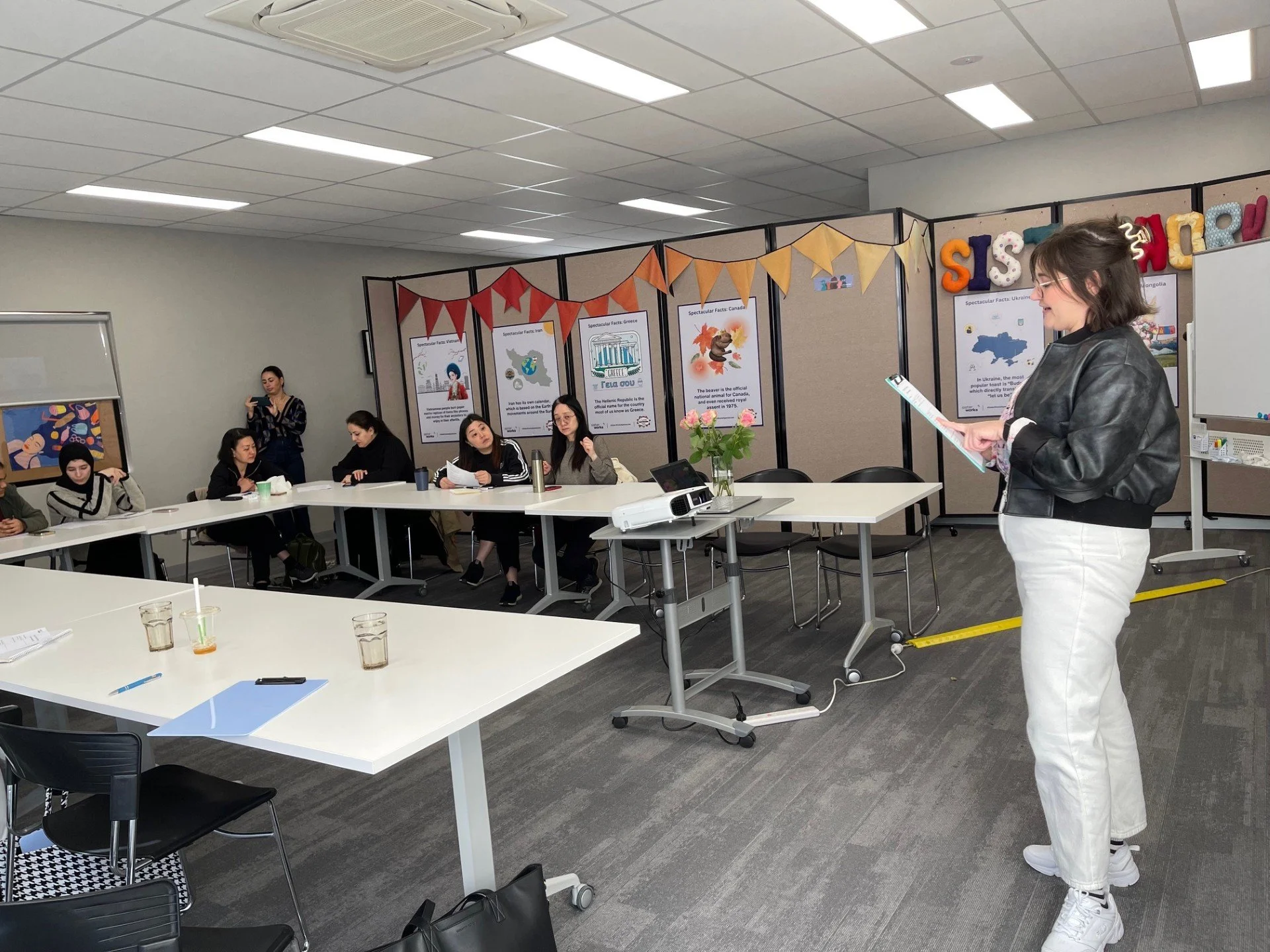 Tessa presenting at SisterWorks