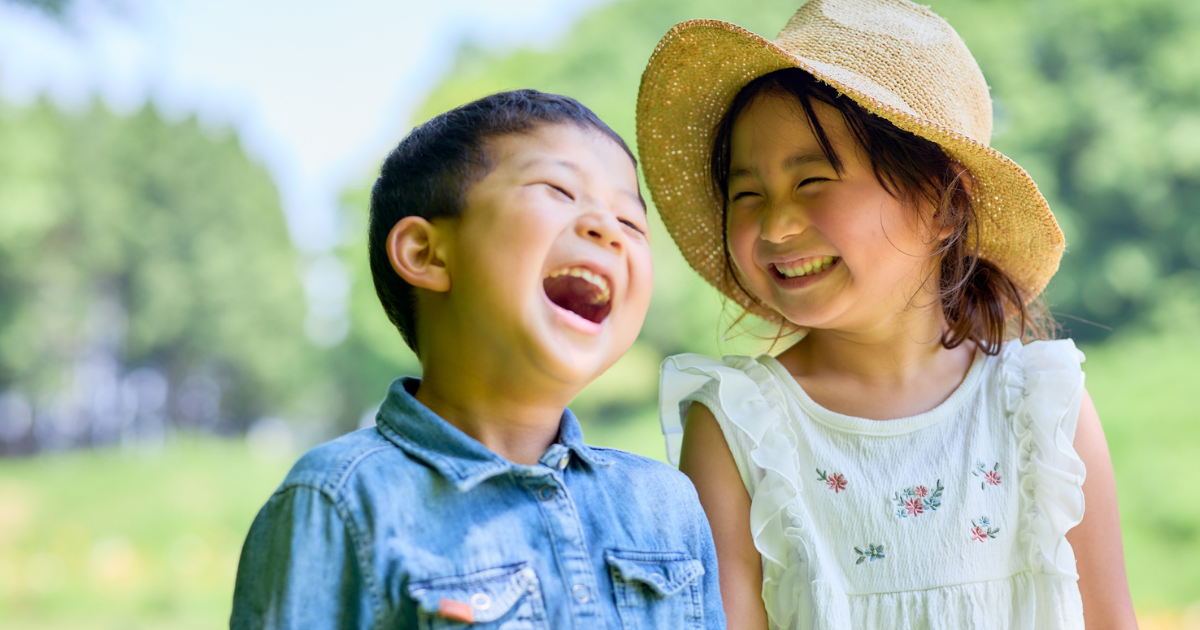 Two kids laughing