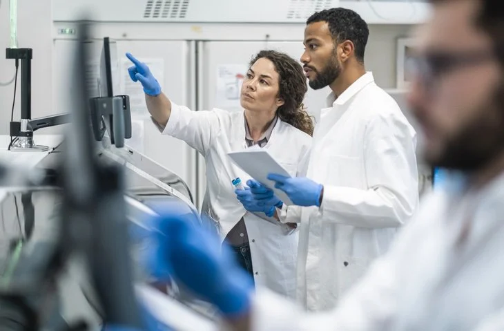 Man and woman conducting medical research in a lab, representing Health & Medical Research in the For-Purpose Sector