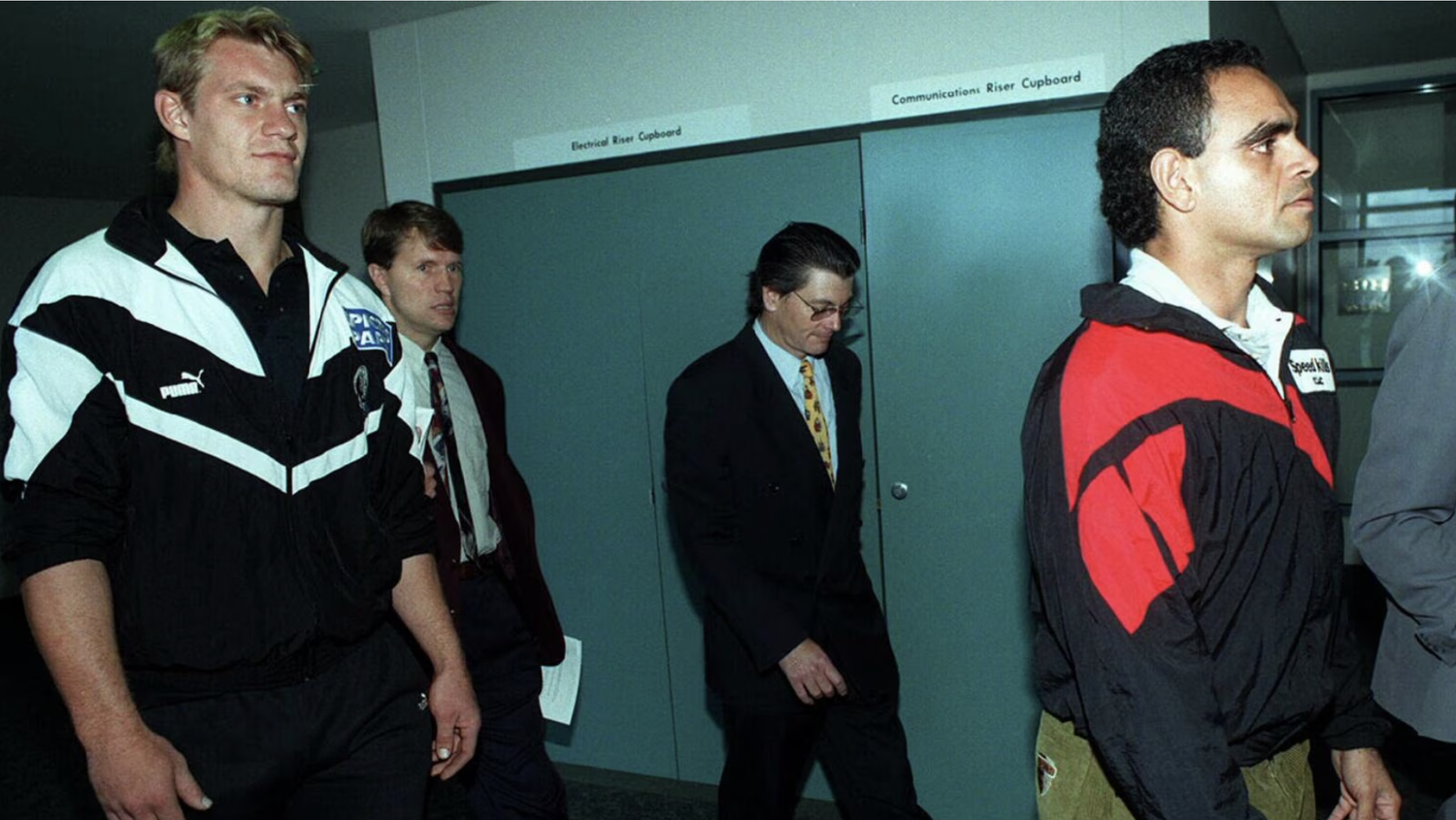 Michael Long leaving AFL House after the 1995 mediation