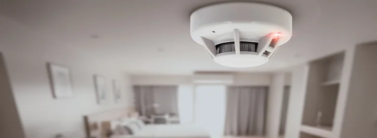 Fix-It Construction Services smoke detector installation on ceiling in residential home Harrisonburg VA