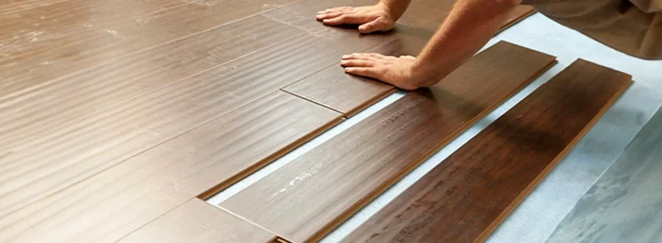 Fix-It Construction Services flooring installation with hardwood planks being installed Harrisonburg VA