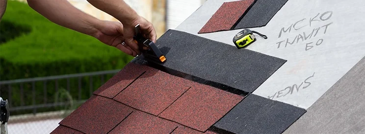 Fix-It Construction Services asphalt shingle roof installation with sample materials Harrisonburg VA
