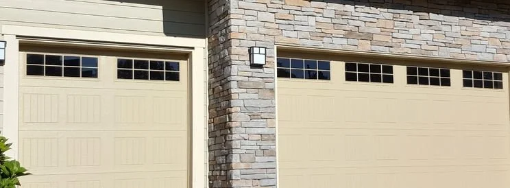 Fix-It Construction Services garage addition with new doors and exterior finish Harrisonburg VA