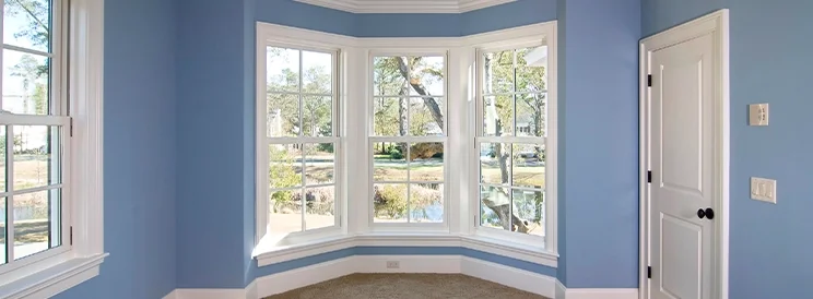 Fix-It Construction Services casement window installation in residential room with bay view Harrisonburg VA