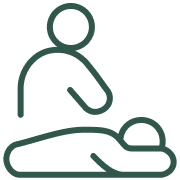 Icon of a person lying on their back on a massage table while a therapist provides a massage.
