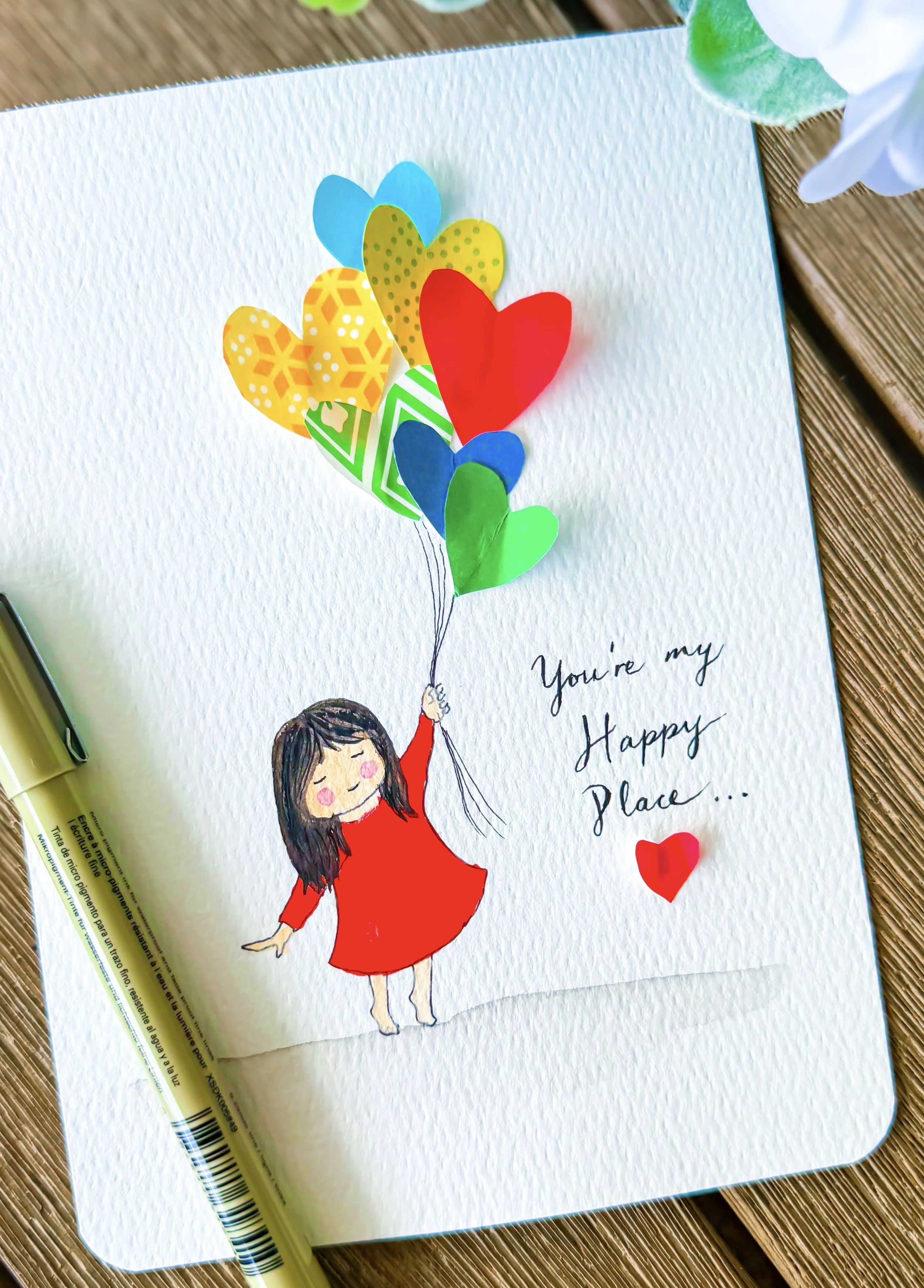 A playful card with 3D layered hearts