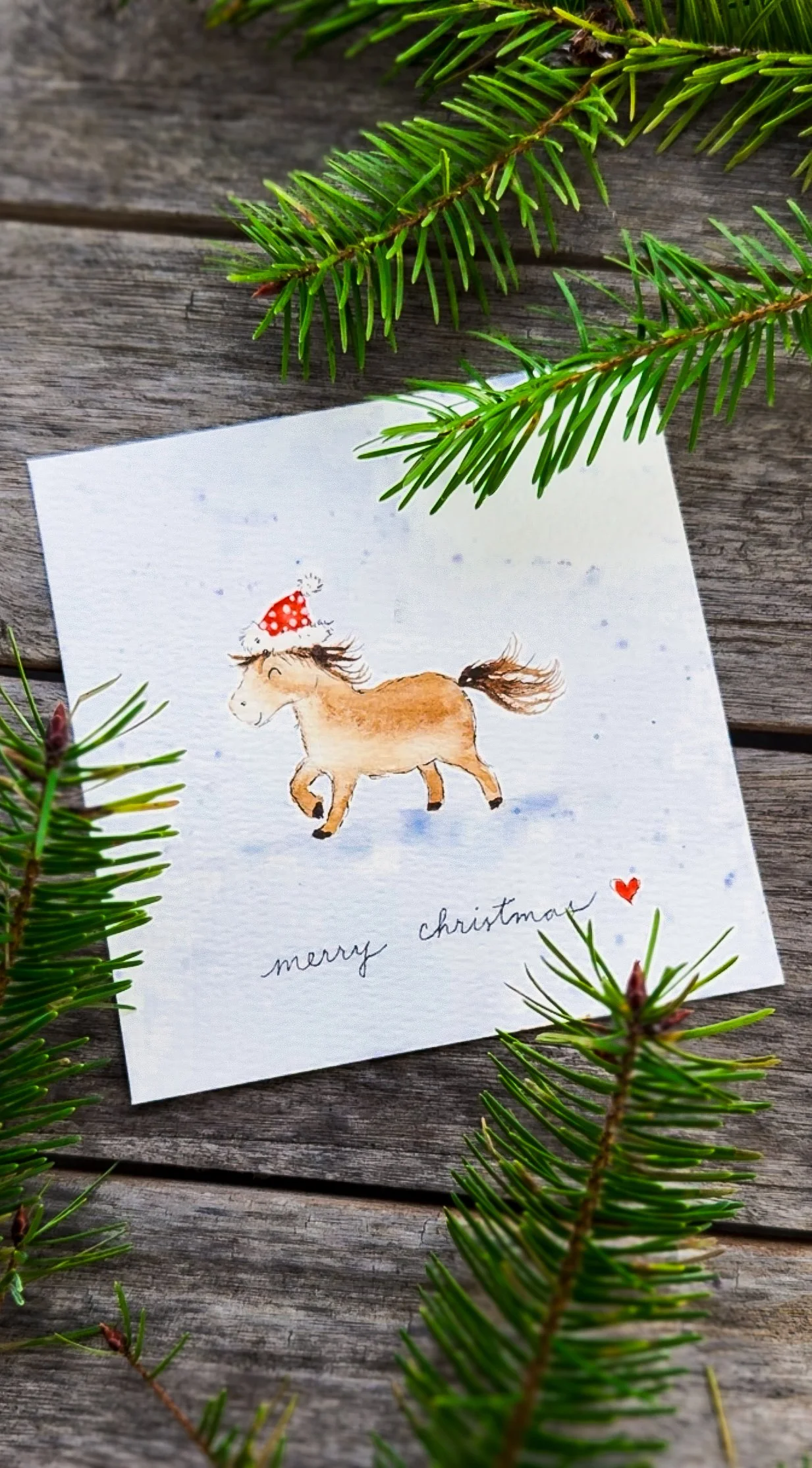 A cozy Christmas card for horse lovers