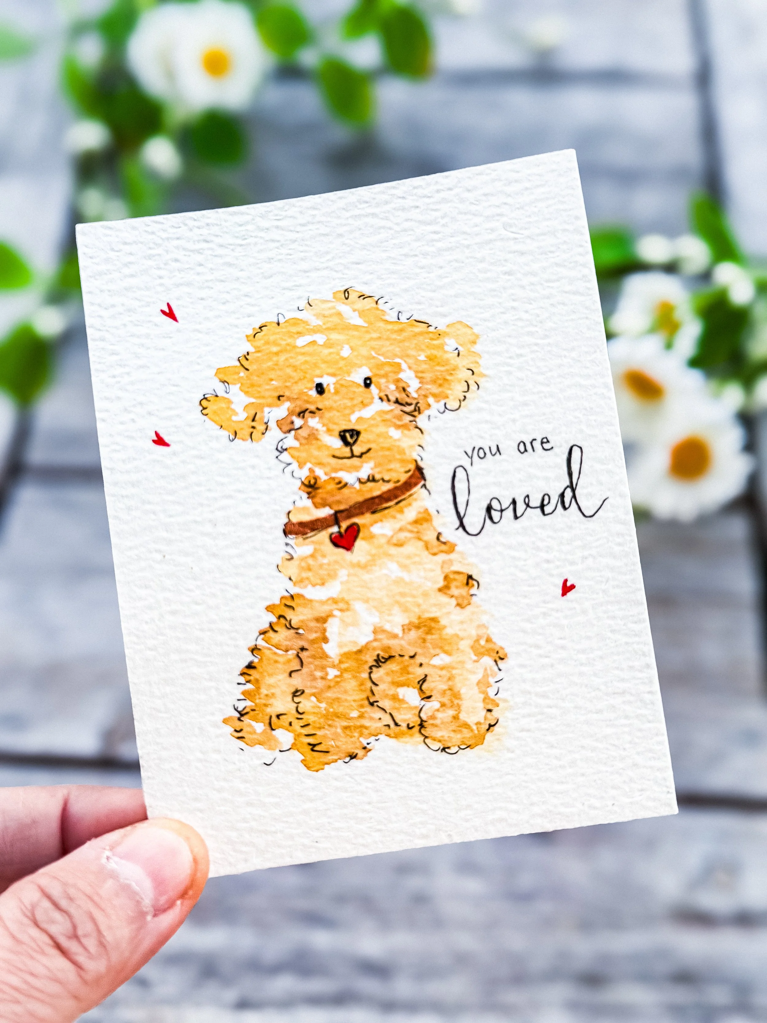 A sweet puppy painted with a dotted brush technique 