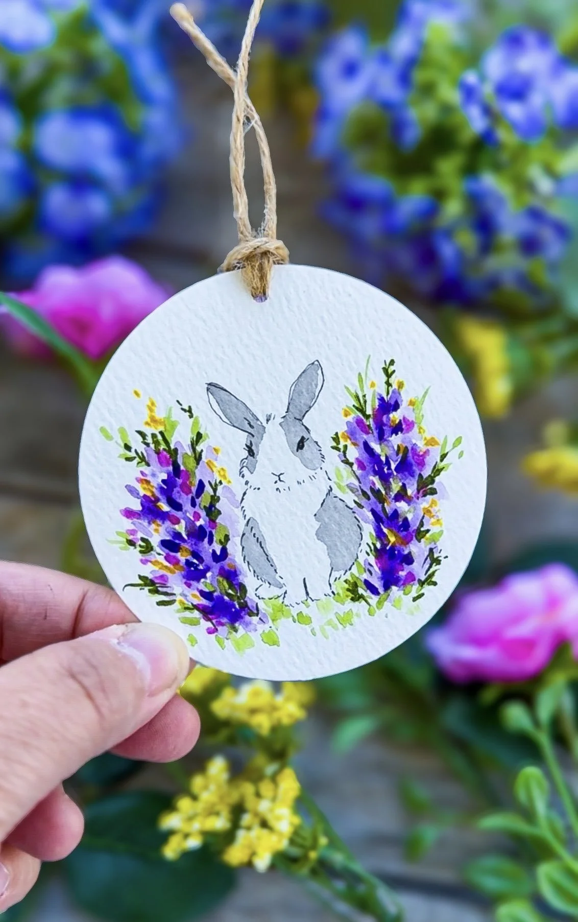 A sweet bunny with spring flowers