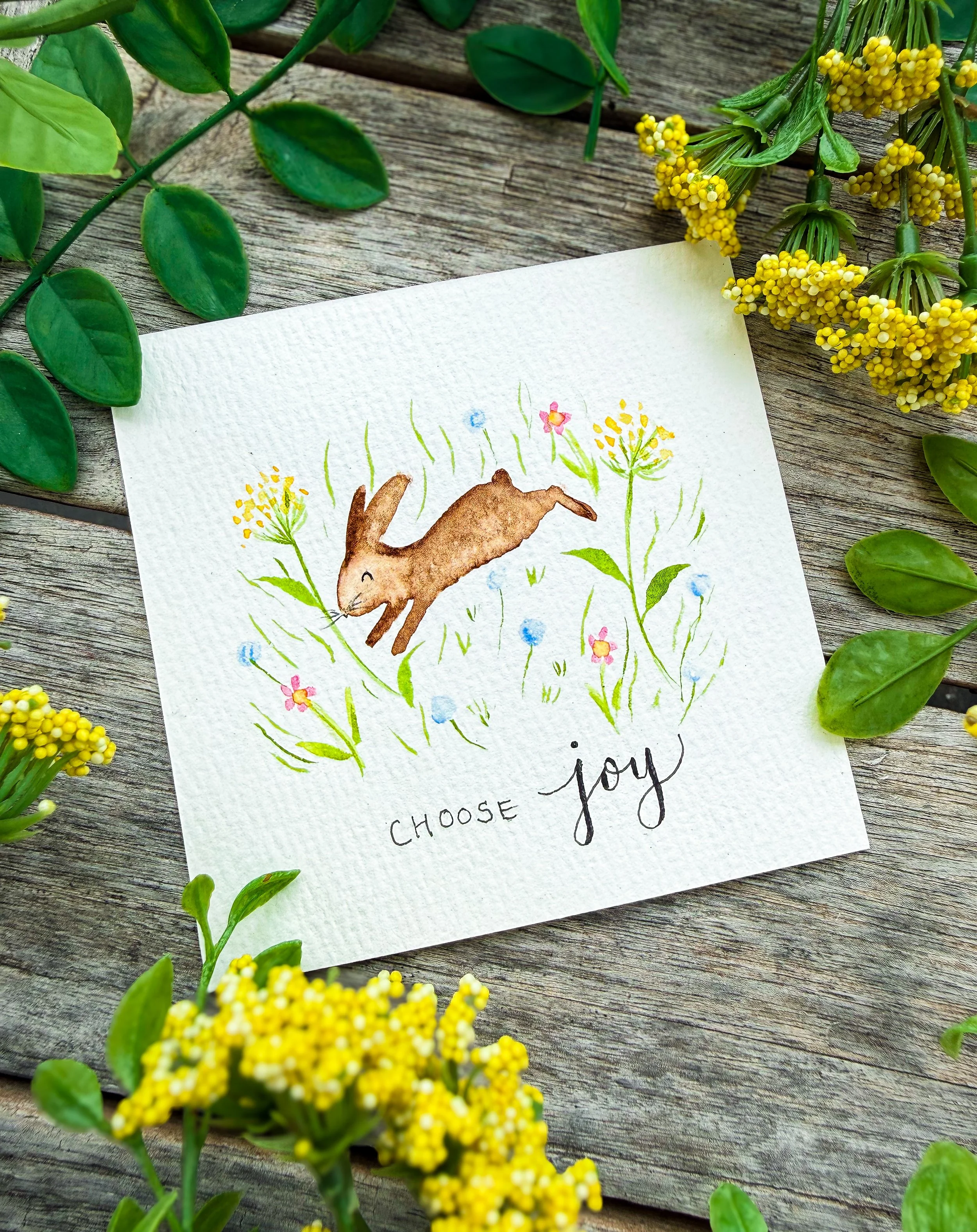A sweet bunny in bloom, painted simply to bring a little joy to everyday moments.