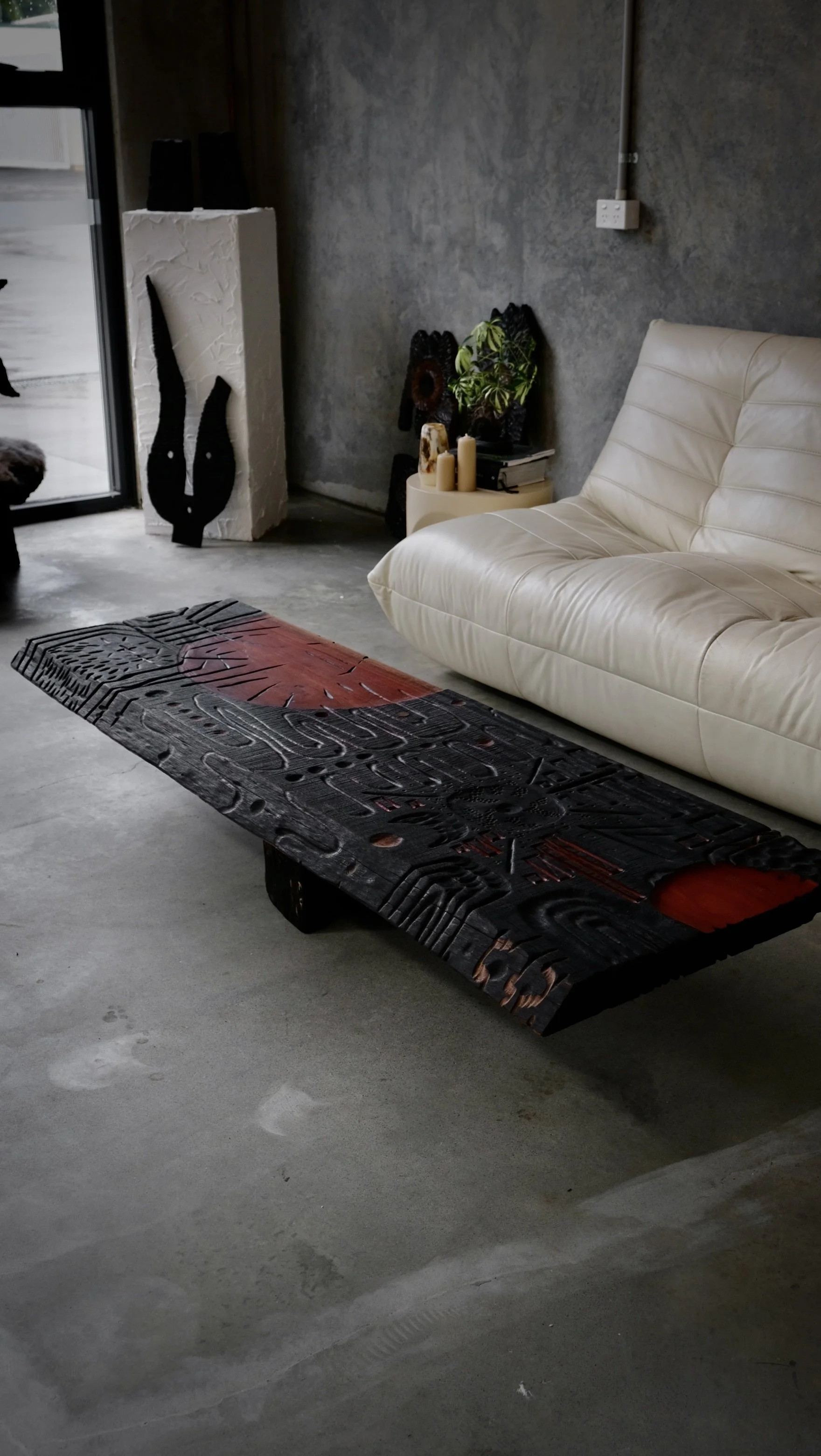 Reclaimed Blue Gum Shou Sugi Ban ceremonial table with carved symbols and red pigment — Kitsune Moon Byron Bay