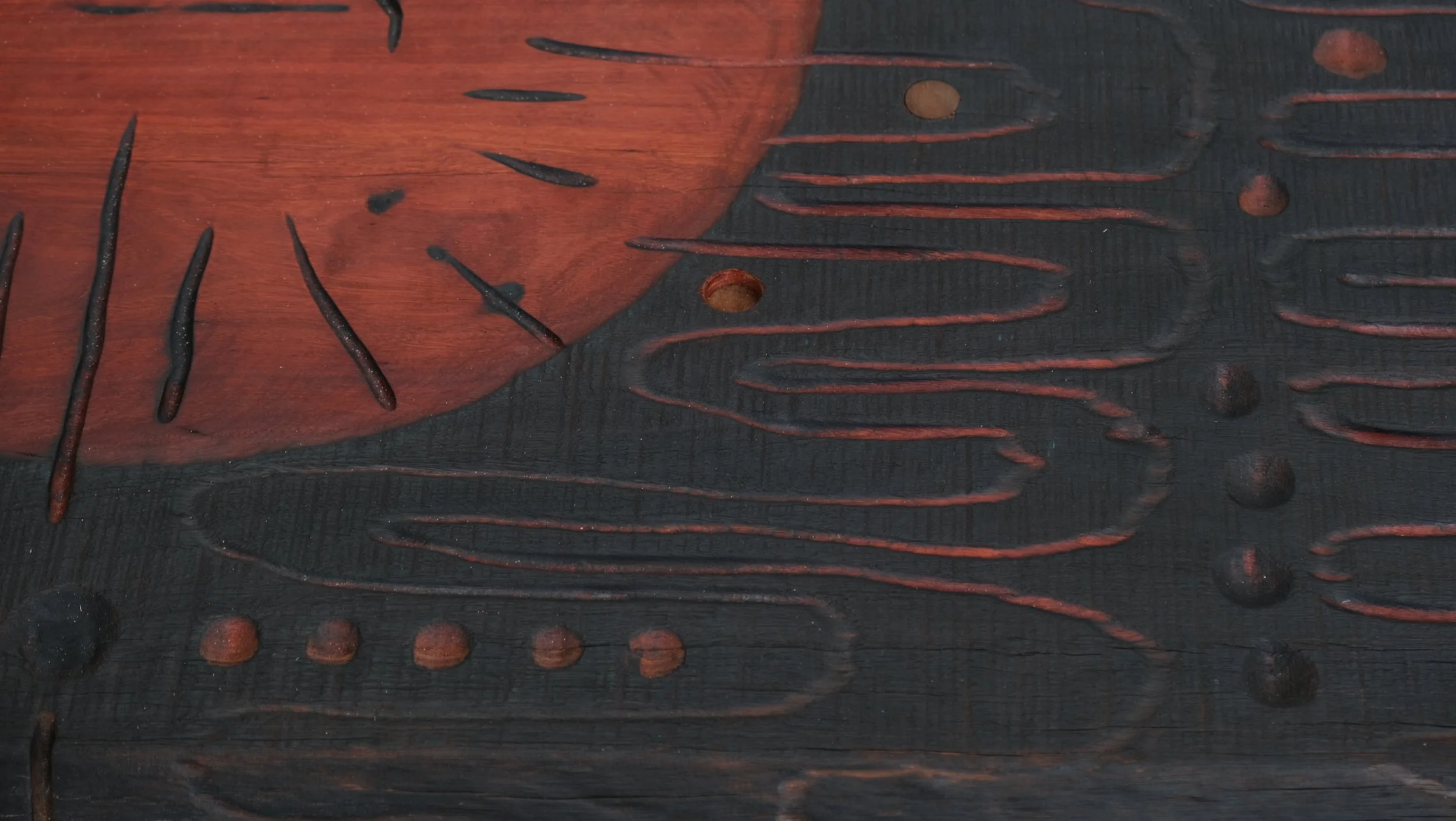 Reclaimed Blue Gum Shou Sugi Ban ceremonial table with carved symbols and red pigment — Kitsune Moon Byron Bay